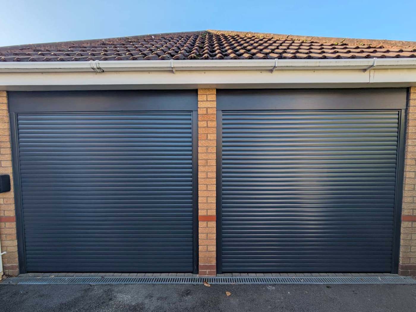 Double black roller garage doors in Telford